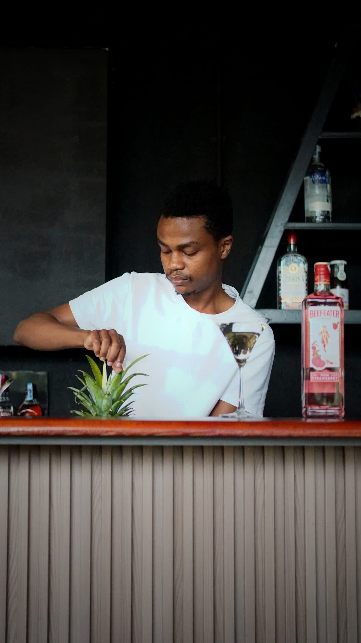 The Yard's drinks counter and bartender at night